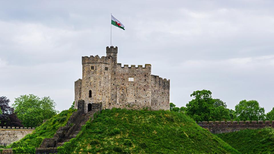 Cardiff castle with Welsh flag flying