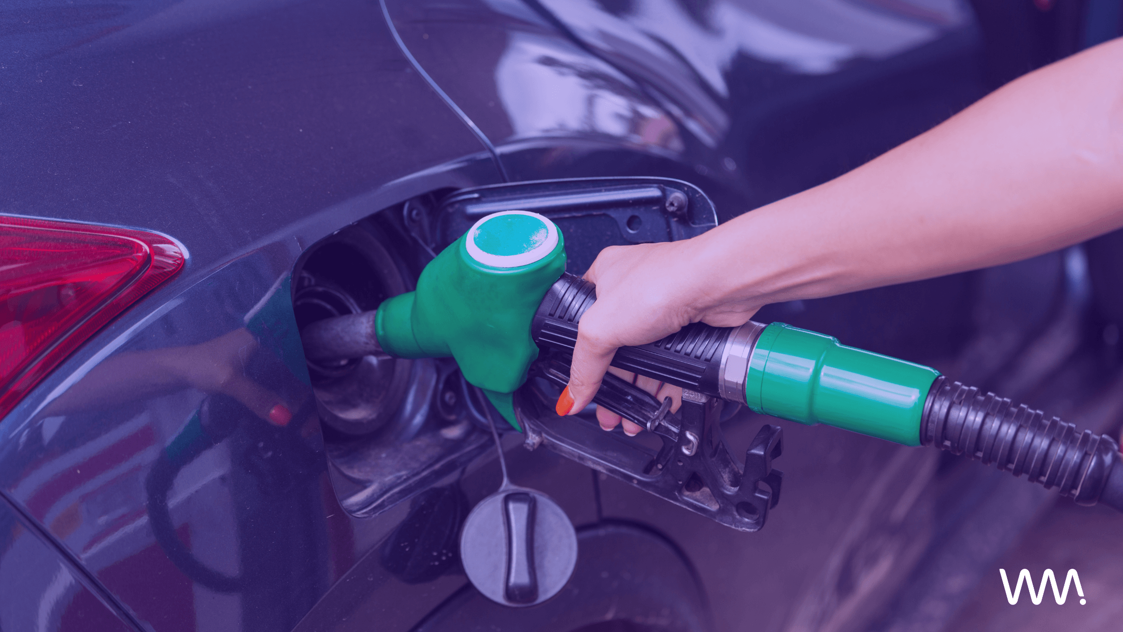 petrol being poured into a car