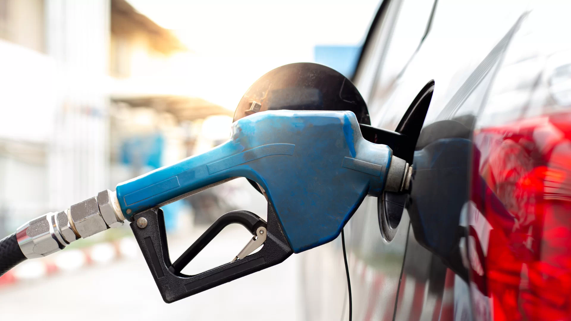 Petrol pump filling up a car