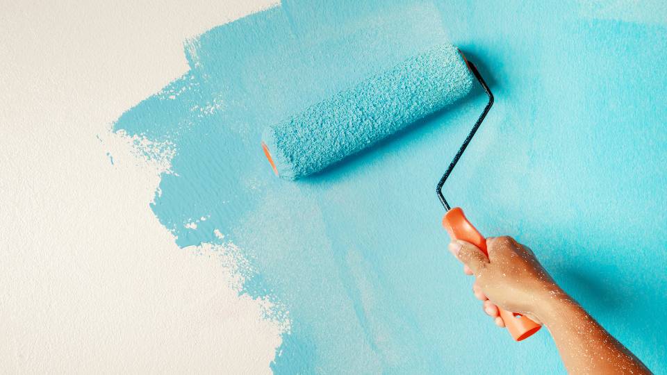 Blue paint on a roller