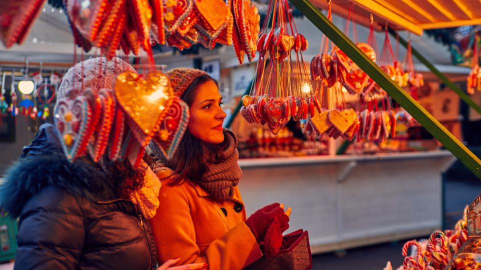 Two women shopping at the Christmas markets