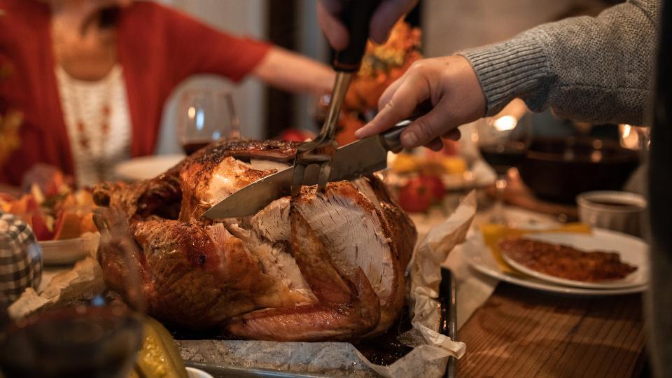 Thanksgiving turkey being carved