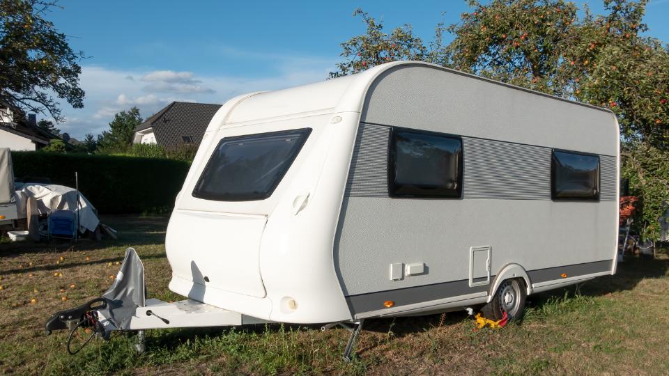 Caravan outside in a garden