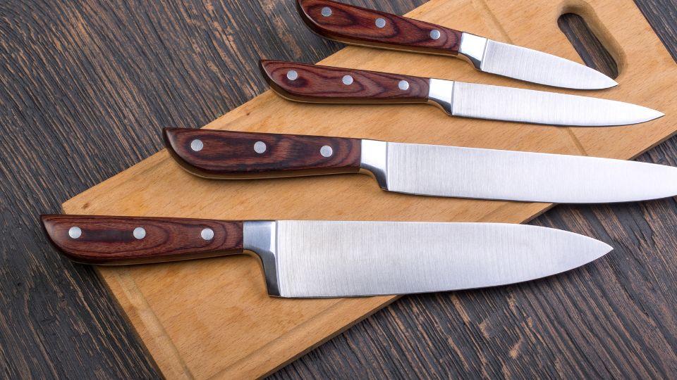 Selection of knives on a chopping board