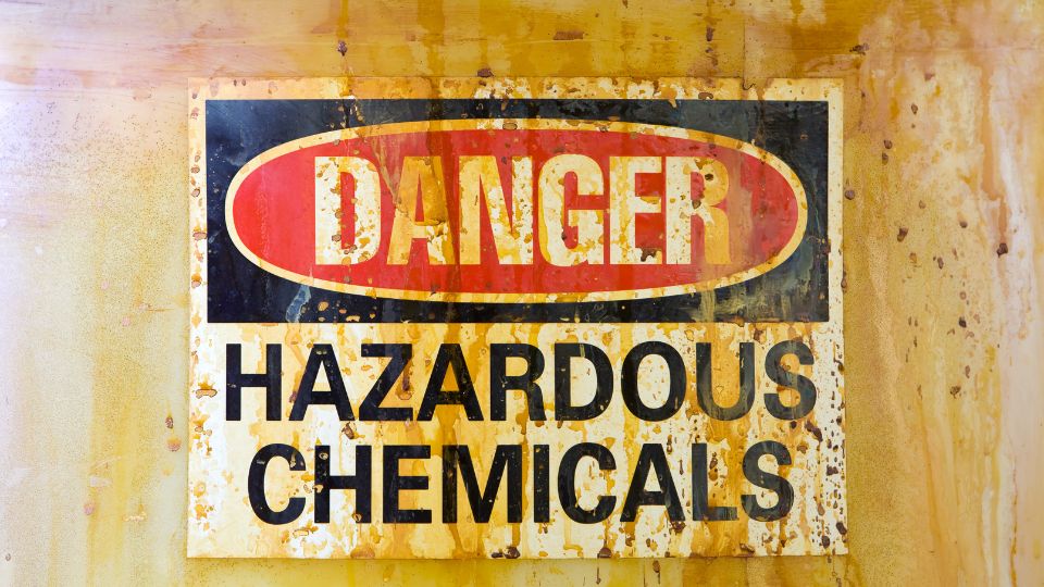a photograph of a tub of hazardous chemicals 