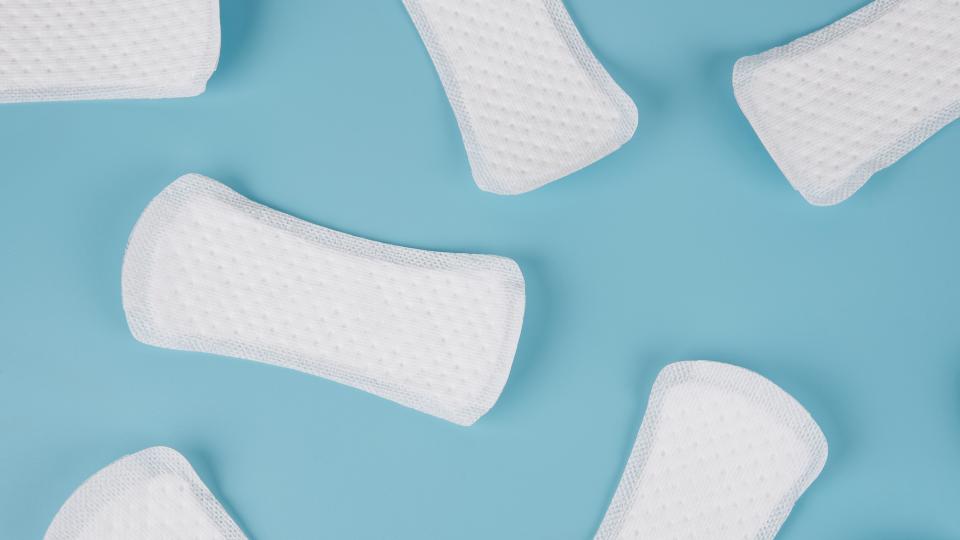 lots of sanitary pads on a blue background
